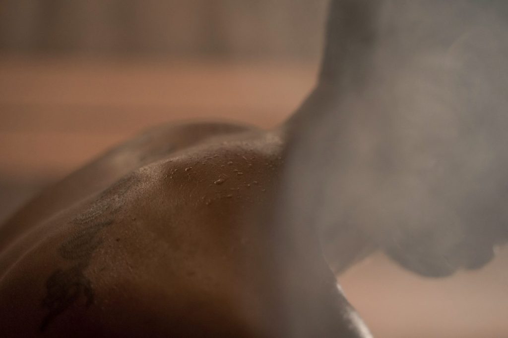 Steam rising in a hot sauna, close view